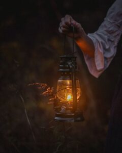girl holding lantern