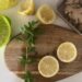Mint, lemon, and ginger on a cutting board
